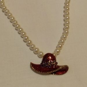 Faux pearl necklace with Red hat Society pendant. Women's